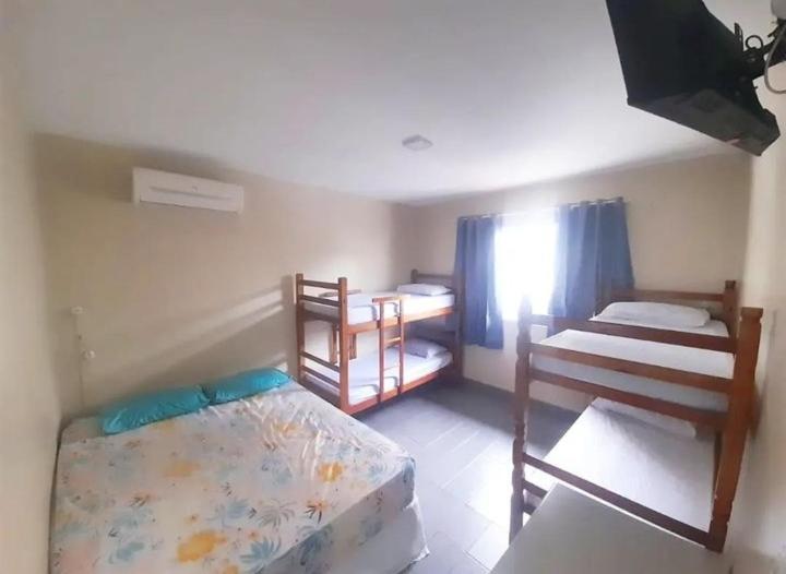Хостел Perola House Гуаружа Номер фото